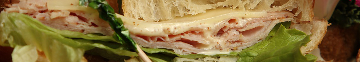 Eating Italian Pizza Sandwich at Amalfi Pizza restaurant in Newark, DE.